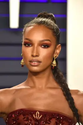 Jasmine Tookes with a high braid