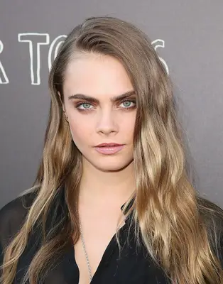 Cara Delevingne with Face-Framing Layers