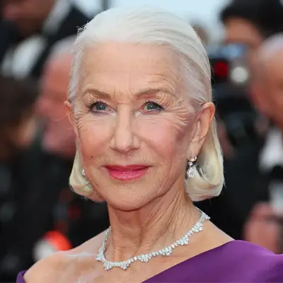 Helen Mirren in a softly brushed back gray chin-length bob on red carpet