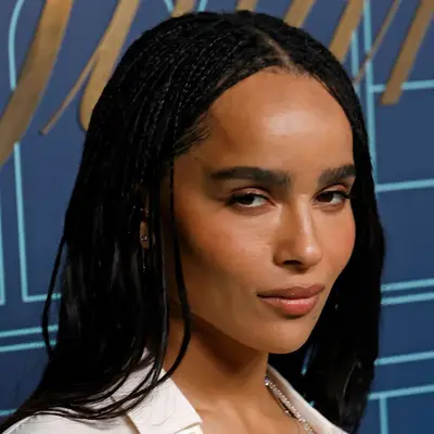 Zoë Kravitz wearing middle-parted micro braids at the 2023 reopening of The Landmark at Tiffany & Co in New York City 
