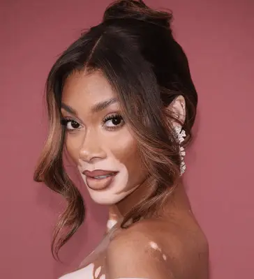 high angle portrait of mixed femme with dreadlocs