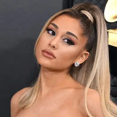 Ariana Grande wears a voluminous high ponytail at the 2020 Grammy Awards