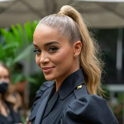 Jasmine Sanders wears a high ponytail with soft waves