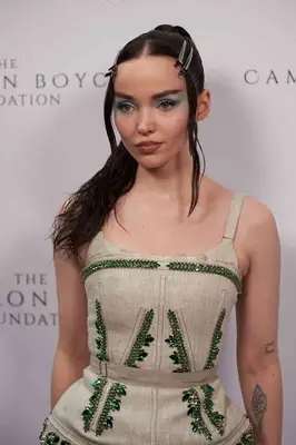 Dove Cameron wearing a sleek high ponytail