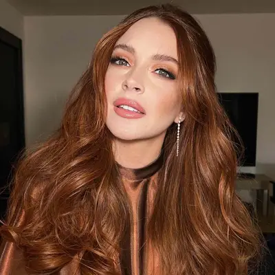 Megan Thee Stallion with cherry coke red hair