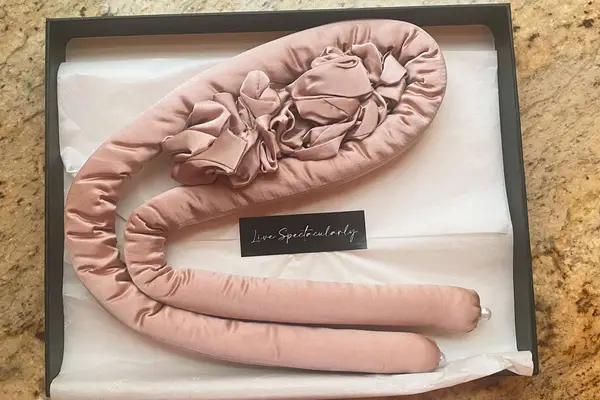 Close up of the Lilysilk Silk Curling Headband and Scrunchie Set in its box