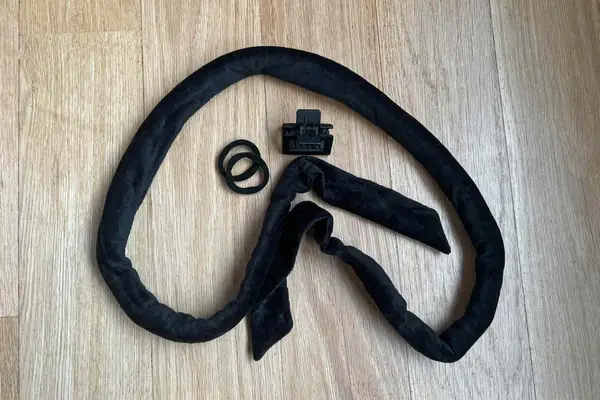 The Mane Label Hair Co. The Original Sway Heatless Curling Velour Ribbon on a wooden surface