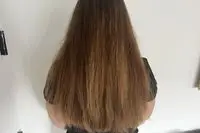 A person showing their hair before using the The Mane Label Hair Co. The Original Sway Heatless Curling Velour Ribbon