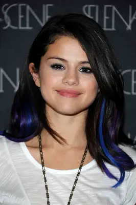 Selena Gomez with blue hair streaks 