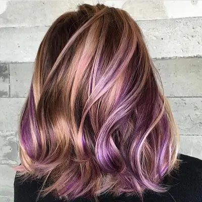 Soft blonde lob with purple highlights