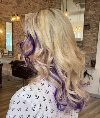 Hidden purple highlights underneath blonde hair
