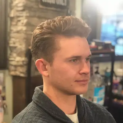 Man with 1950s James Dean-inspired hairstyle