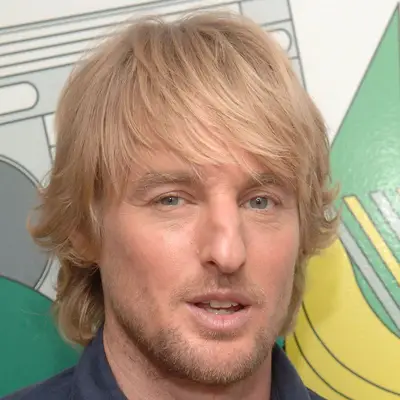 Owen Wilson with surfer fringe haircut
