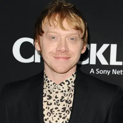 Rupert Grint wears a relaxed fringe haircut