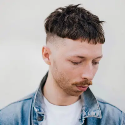Man with short bowl cut