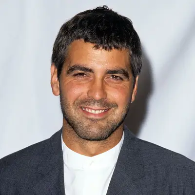George Clooney wears a Caesar fringe haircut