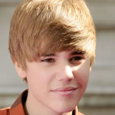 Justin Bieber wears his teen signature swooping fringe haircut