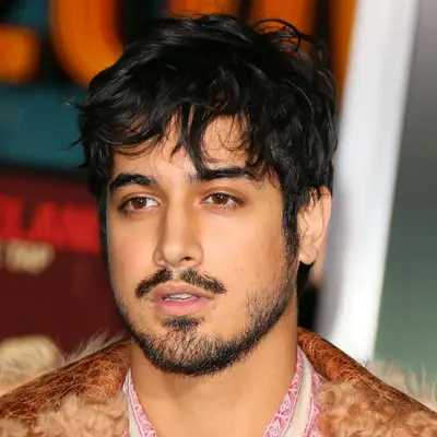 Avan Jogia wears a bedhead fringe haircut