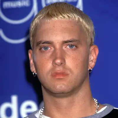 Eminem wears a bleached Caesar fringe haircut