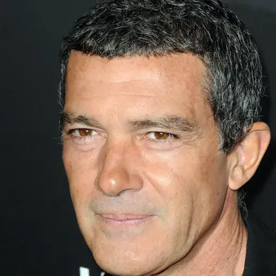 Antonio Banderas in a salt-and-pepper Caesar haircut