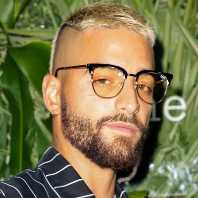 Maluma wears a bleached Edgar fringe haircut