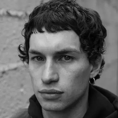 Man with modern Caesar fringe haircut