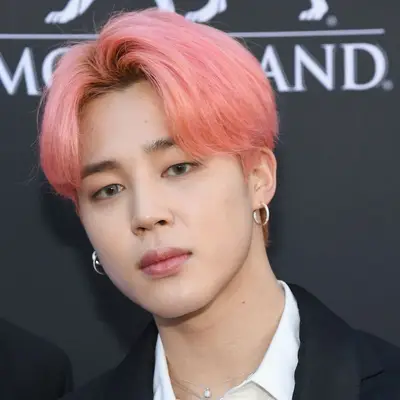 Jimin wears a pink 
