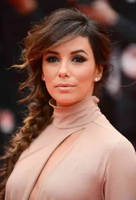 Eva Longoria with a side-swept braid on the red carpet