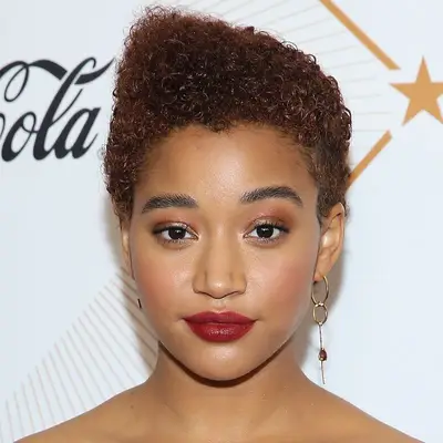 Red Hair Amandla Stenberg with a naturally textured pixie cut