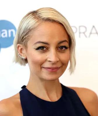 Nicole Richie with a Long side parted Pixie Cut