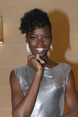 Maria Borges with a Long curly Pixie Cut