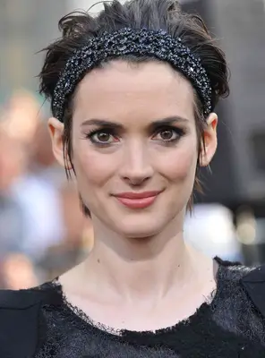 Winona Ryder with a Long accessorized Pixie Cut
