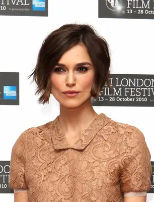 Keira Knightley with a Long Pixie Cut with textured and tousled waves