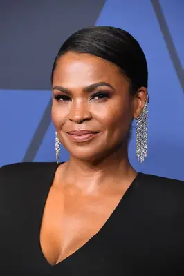 Nia Long with a slicked to the side long pixie cut