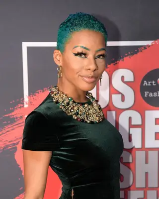 woman with a Teal pixie hairstyle