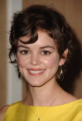 Nora Zehetnerwith a curly Long Pixie Cut