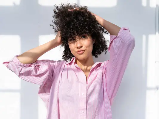 woman playing with hair