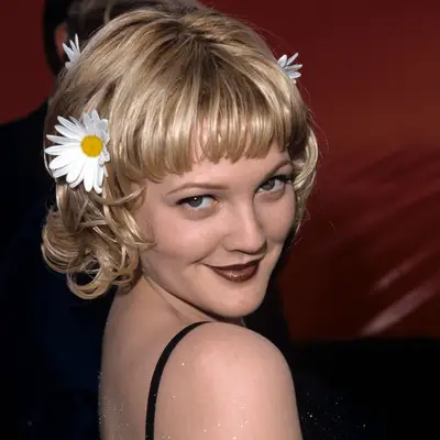 Drew Barrymore wearing flowers in bob haircut