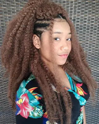 Image of woman with unraveled Marley twists