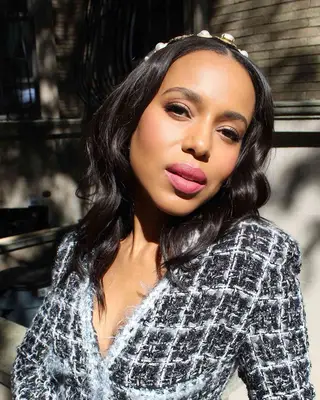 Gabrielle Union with curled hair and chocolate brown highlights