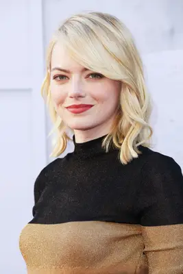 Emma Stone side-swept bangs and blonde bob