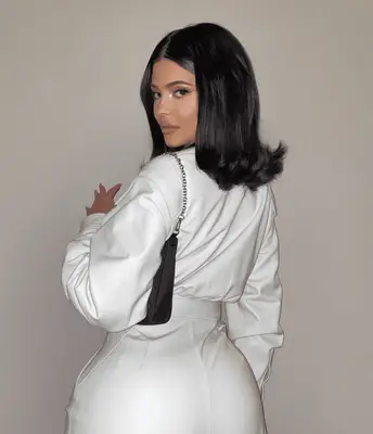 Kylie Jenner in all-white outfit with flipped-out lob