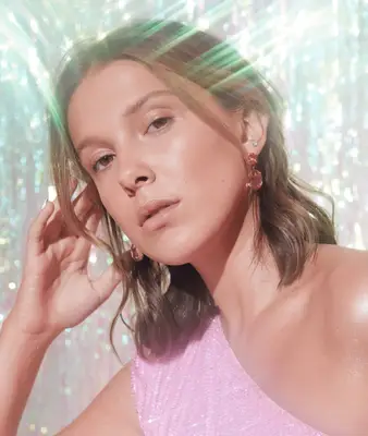 Millie Bobby Brown with tousled lob and caramel highlights