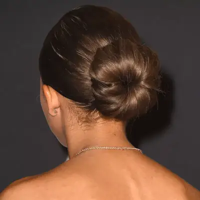 Zendaya wears a classic low sock bun