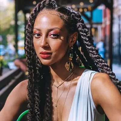 Woman wears jumbo Marley twists