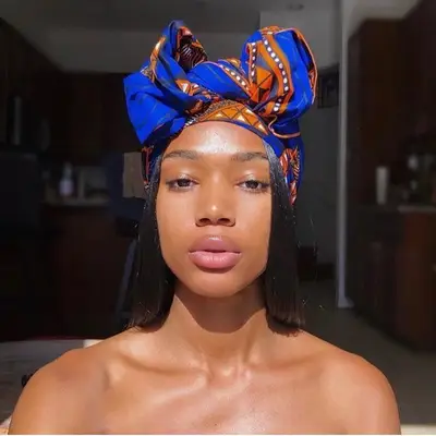 Woman wears a head wrap hairstyle