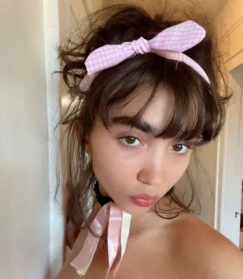 Rowan Blanchard thick, wispy bangs with bow headband