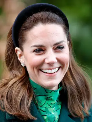 Kate Middleton wearing a black velvet headband