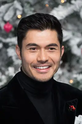 Henry Golding with short, textured haircut