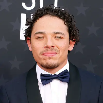 Anthony Ramos with short defined curls